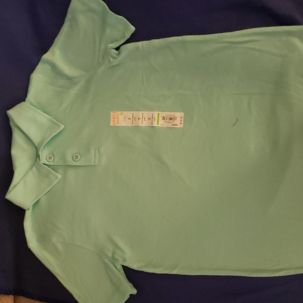 School starts soon! Brand new, never worn boys, size 7 polo shirt